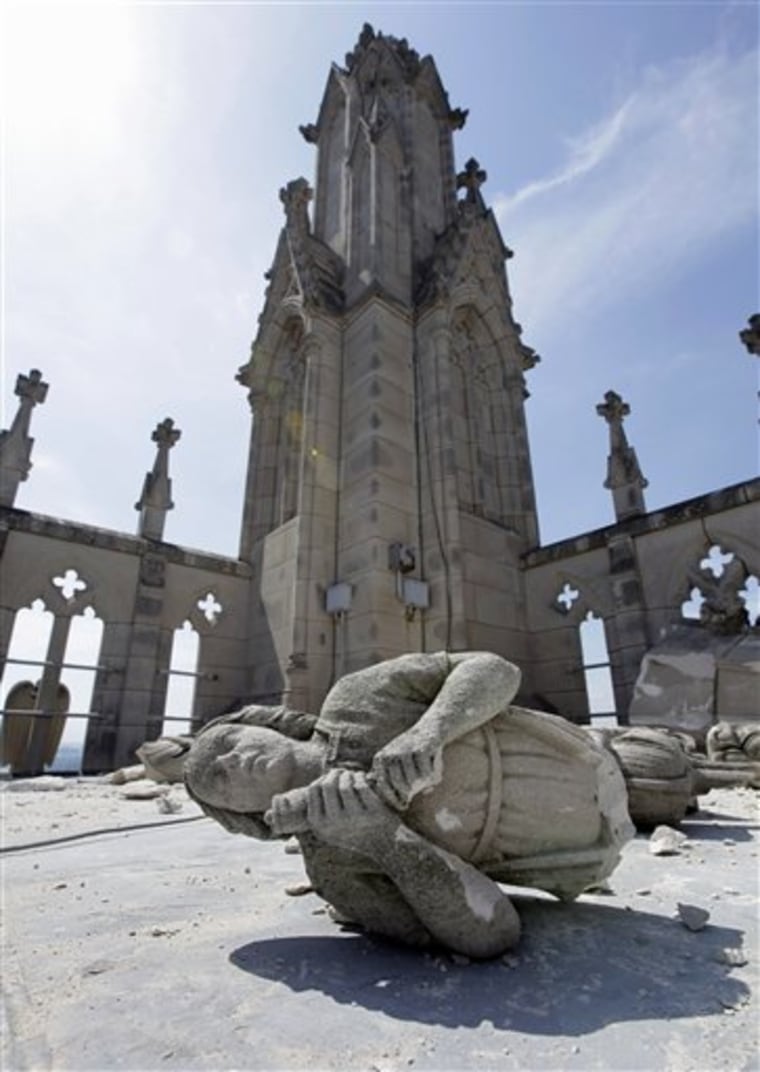 File-In this Wednesday 24,2011 file photo an angel, carved from Indiana limestone, lies shattered amid other damage on the roof of the Washington National Cathedral in Washington, after Tuesday's earthquake. The East Coast earthquake left more than just residents unaccustomed to feeling the ground shake and sway in a daze. It also surprised scientists who spend their careers trying to untangle the mysteries of sudden ground shifts. (AP Photo/J. Scott Applewhite,File)